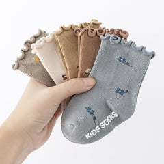 Baby dispensing non-slip socks